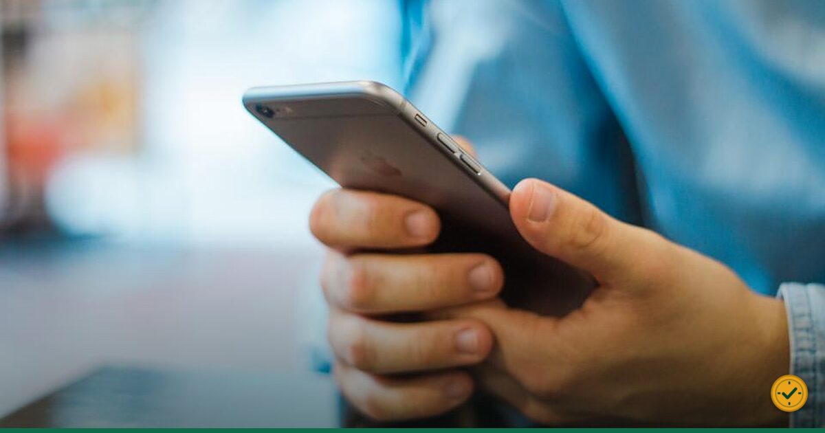 Hand holding a smartphone