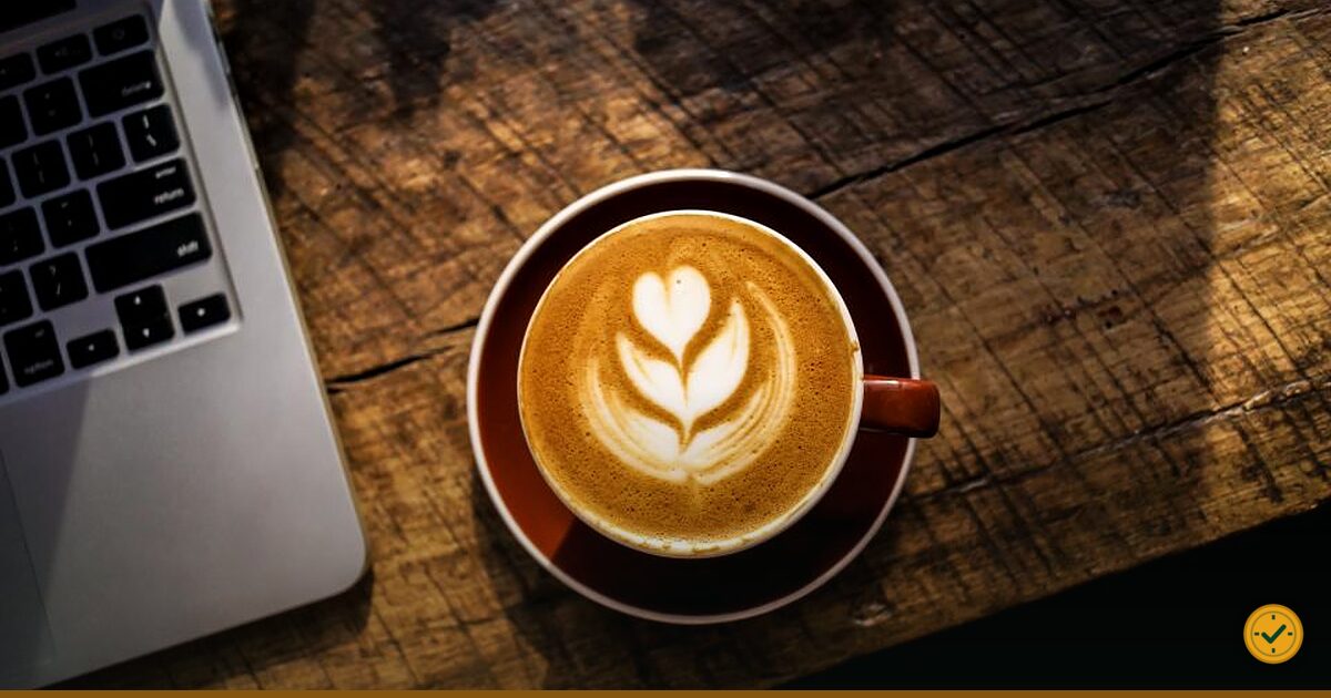 Latte with leaf pattern in the foam