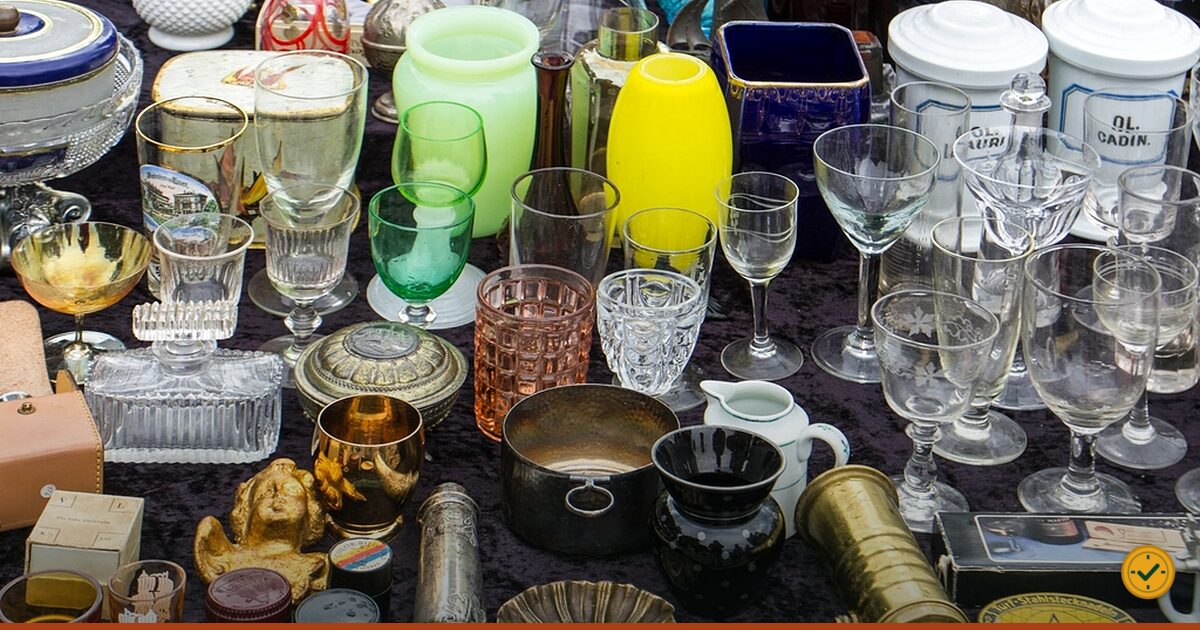 Glassware laid out on a market stall