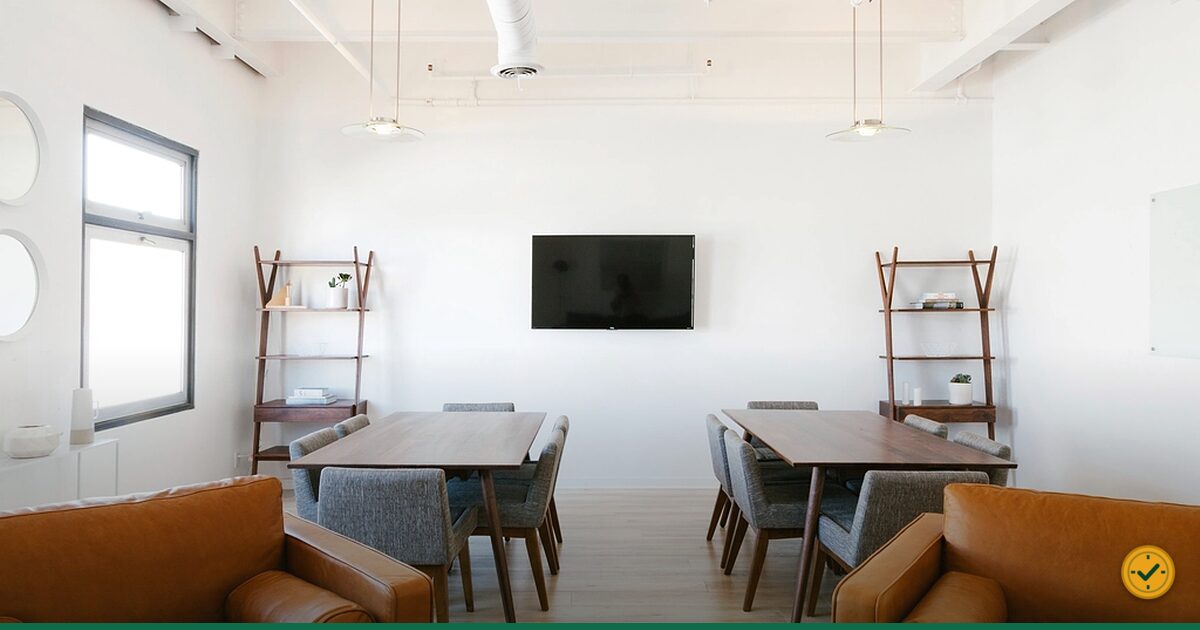 Television mounted on a white wall